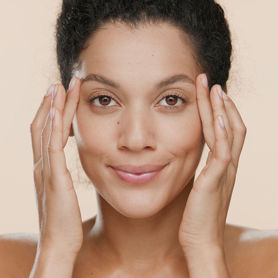 Woman touching her eyebrows