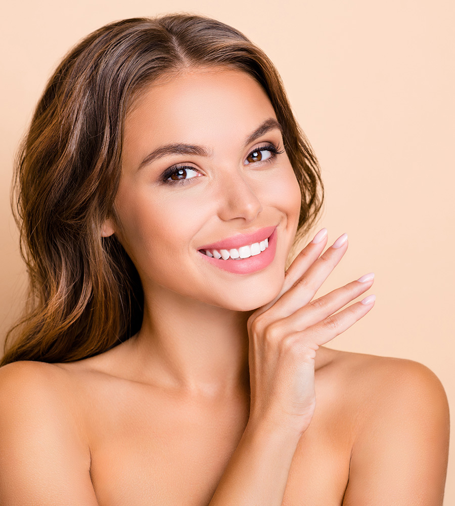 Young woman with brown hair smiling