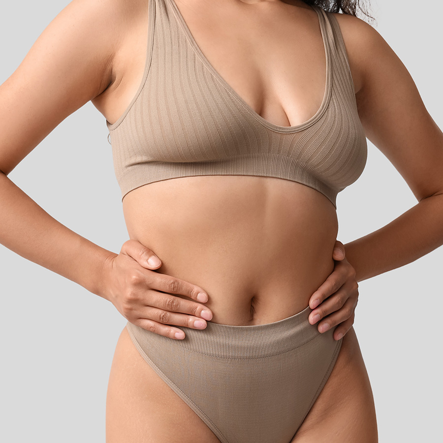 A woman with her hands on her hips